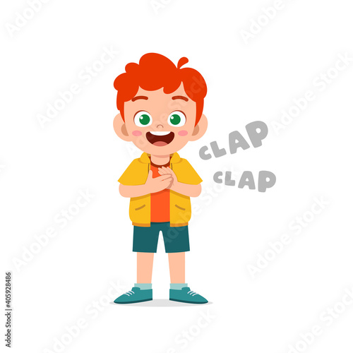 happy cute little kid boy standing and clap the hand