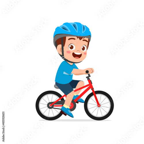 happy cute little kid boy riding bicycle