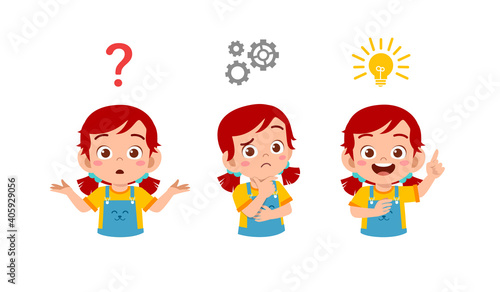 happy cute little kid girl thinking and searching idea process