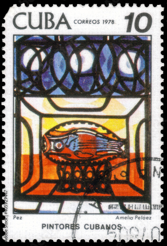 Postage stamp issued in the Cuba the image of the Fish. From the series on Paintings from Cuban Artists, Amalia Pelaez del Casal, circa 1978 photo