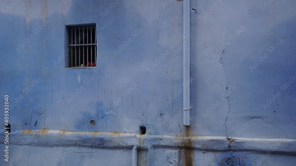worn blue wall