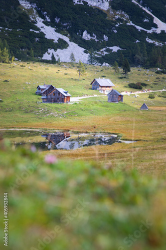 Alpine huts below high peaks. Tauplitz surroundings.