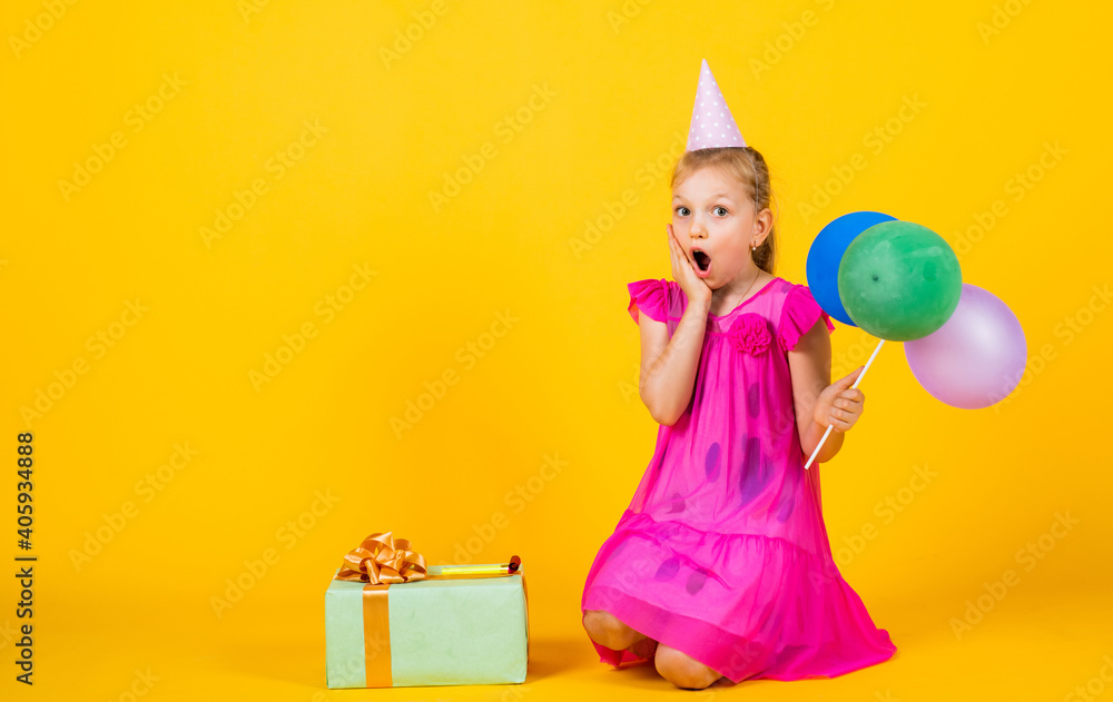 happy teen girl with present box and party balloons, childhood happiness