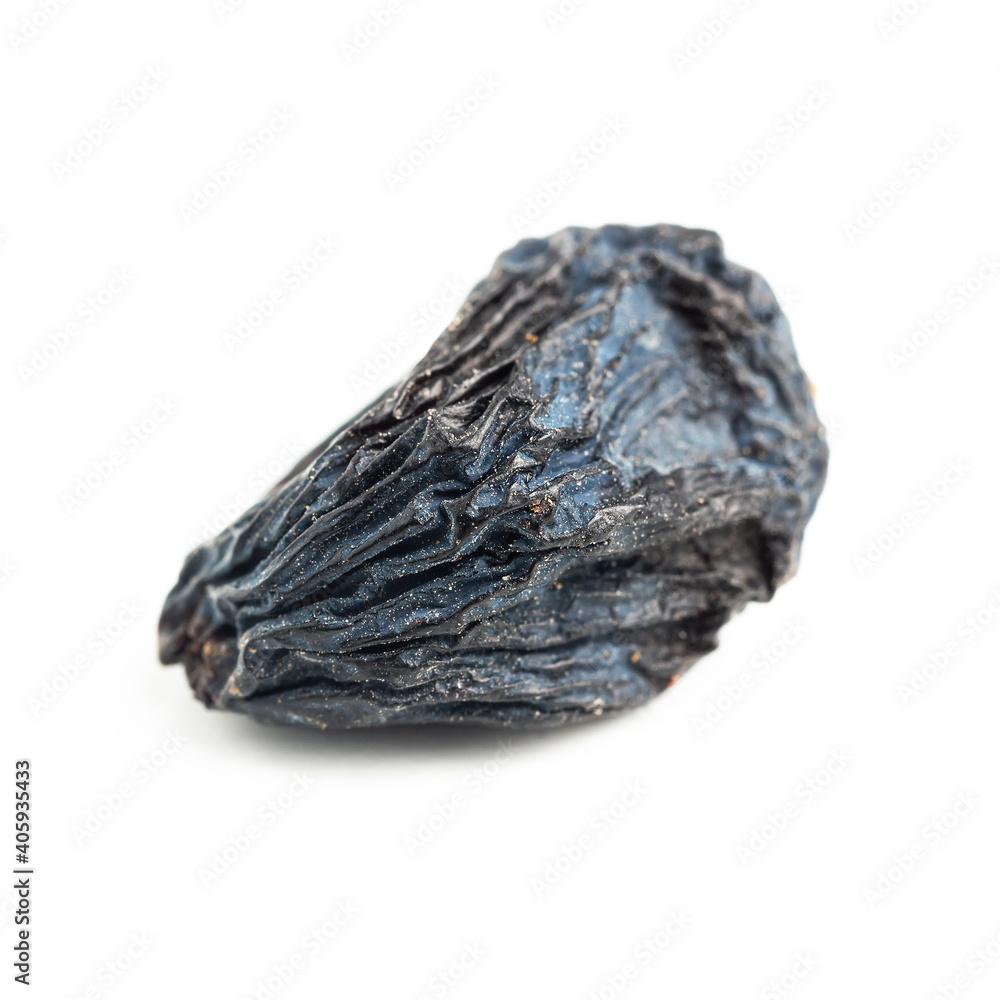Dark blue raisins isolated on white background, close-up view Dark blue raisins isolated on white background, close-up view