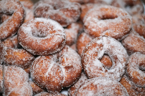 Fried homemade traditional italian doughnuts sweets,fat tasty food.donuts