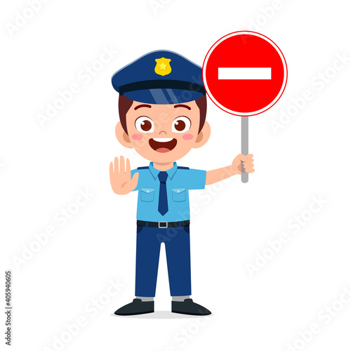 happy cute little kid boy wearing police uniform and holding stop sign