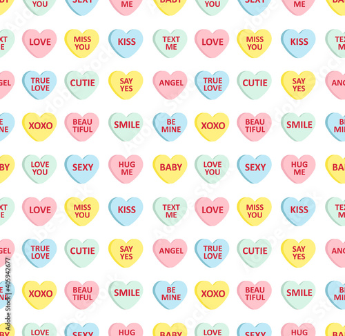 Vector seamless pattern of different color flat cartoon Valentine’s candy with love text isolated on white background