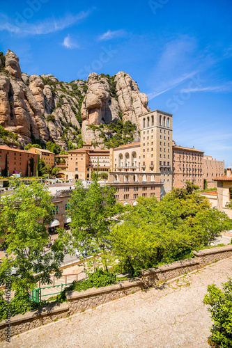 Montserrat, Spain - August 8, 2016: Montserrat mountains and Benedictine monastery of Santa Maria de Montserrat, Montserrat, Spain, August 8, 2016