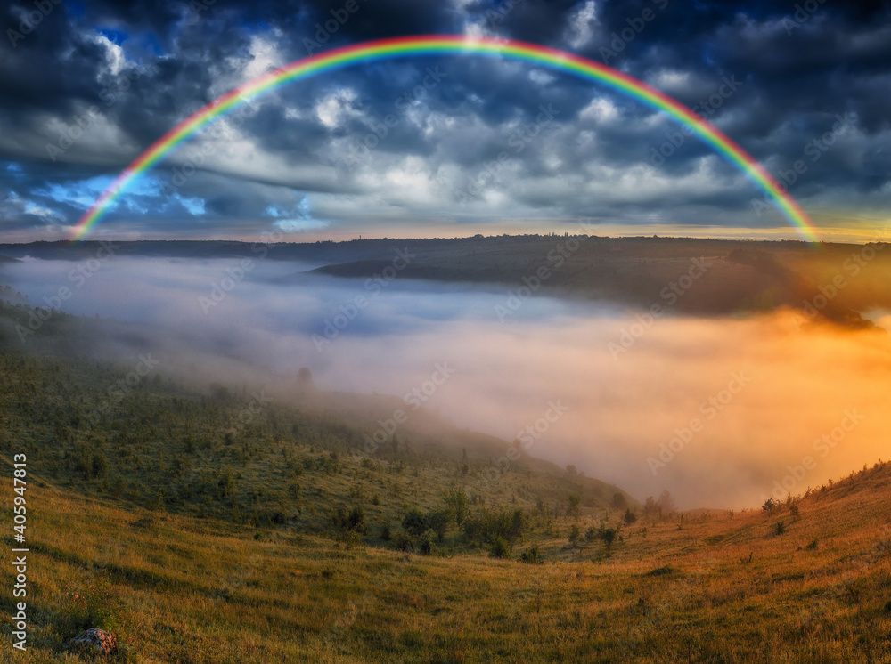 Beautiful landscape with a rainbow in the sky Beautiful landscape with a rainbow in the sky