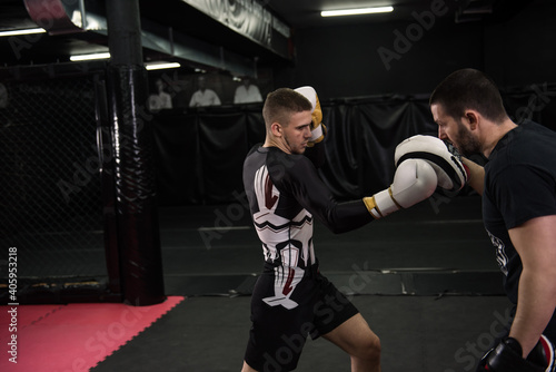 Wallpaper Mural Two men sparring together on kick box training Torontodigital.ca