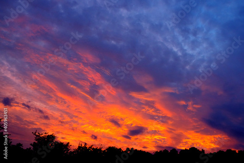 Beautiful fiery sunset during twilight hour © taffpixture
