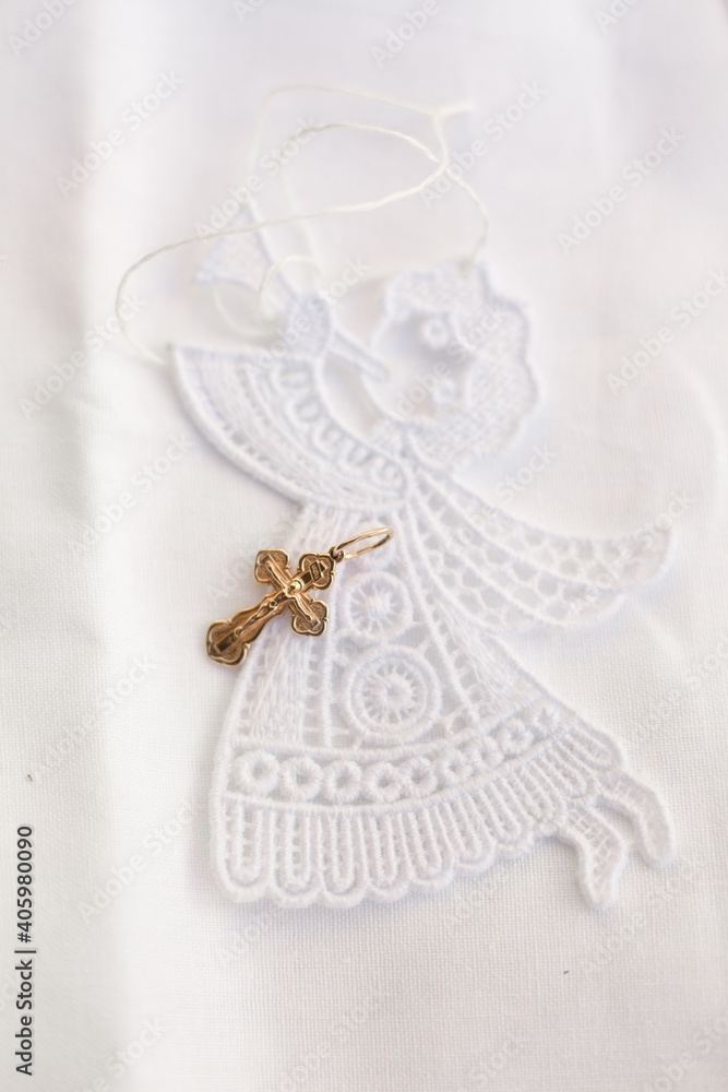 Christening accessories: little golden cross on embroidery of angel Christening accessories: little golden cross on embroidery of angel