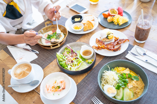 eating variety food for breakfast in morning