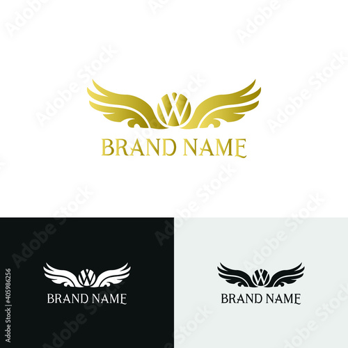Fototapeta Naklejka Na Ścianę i Meble -  letter W and wings in luxury and elegant golden style logo design