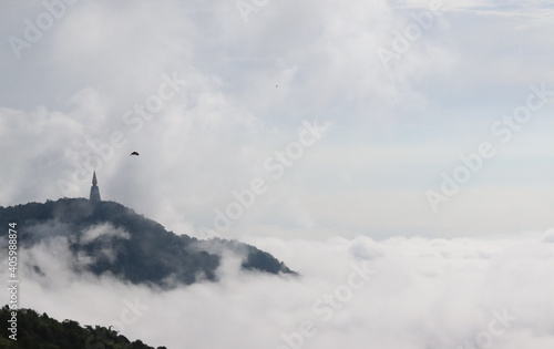 Natural photos from the top of the mountain There are clouds and fog all over the sky. Covered over the mountain forest There is a cold, relaxing, ideas for travel pictures. Rest on vacation © santod32