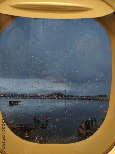 View of the sea from a ship window on a rainy eveni photo