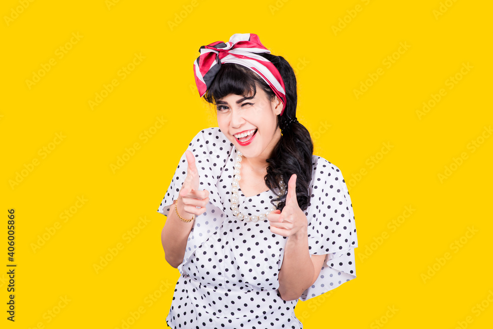 Wow, Closeup red head young woman pretty amazed pinup girl in button shirt excited surprised shocked looking up to side retro vintage 50s hairstyle on yellow wall. Cute face expression Wow, Closeup red head young woman pretty amazed pinup girl in button shirt excited surprised shocked looking up to side retro vintage 50s hairstyle on yellow wall. Cute face expression