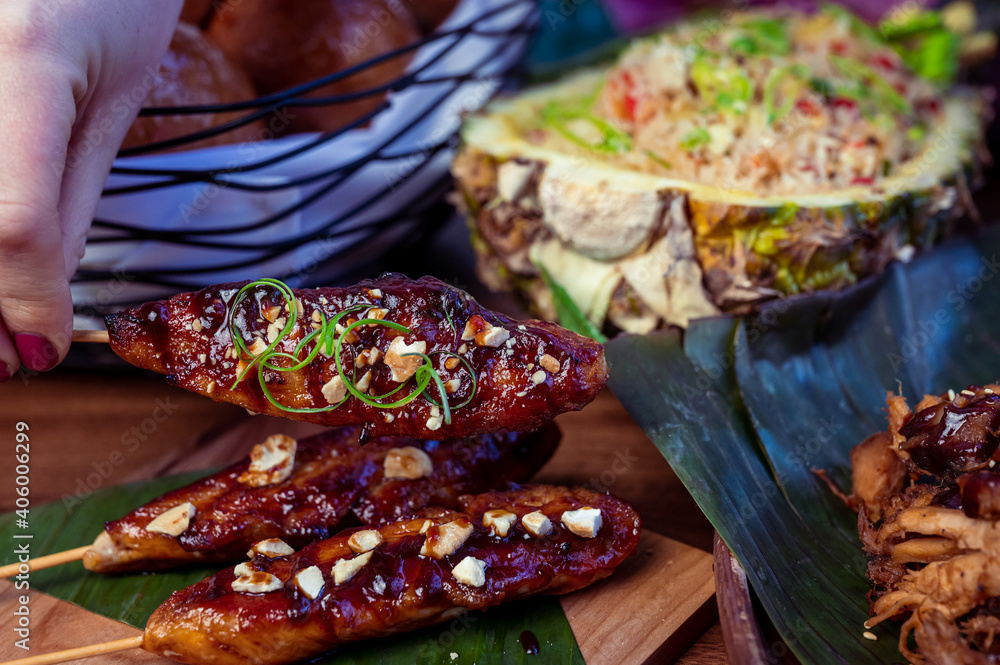 Hawaiian food table - pulled pork, chicken skewers