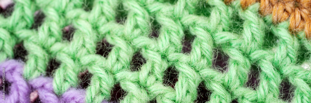 Obraz premium Panoramic wool pattern. Multi colored wool thread yarn background texture