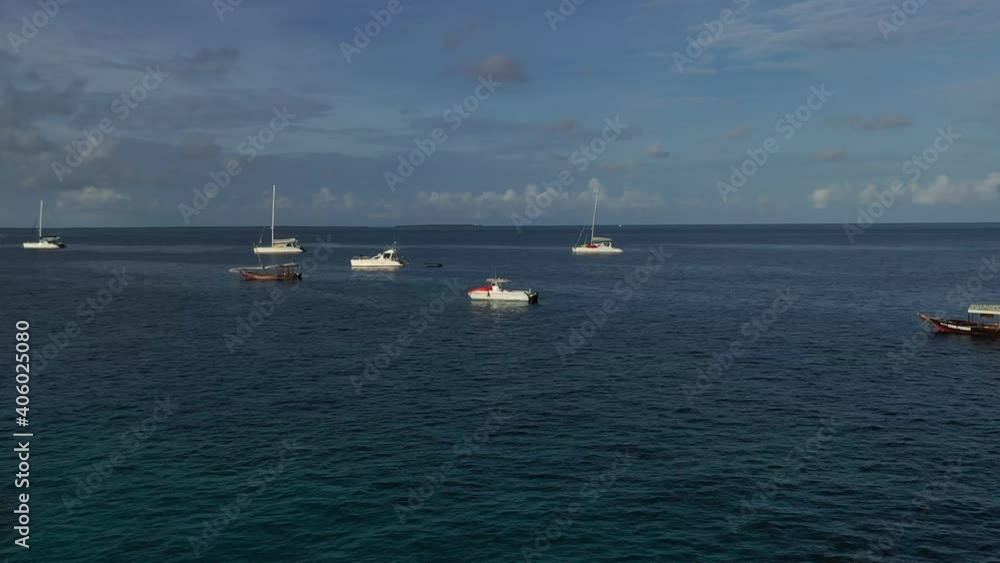 Zanzibar. A yacht in the Indian Ocean. Aerial clip of a local Dhow boat. Zanzibar. A yacht in the Indian Ocean. Aerial clip of a local Dhow boat.