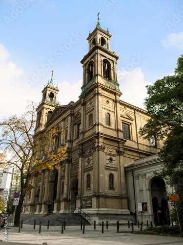 Warsaw, Poland - October 9, 2018: All Saints Church in Warsaw, side view. Ancient temple with two tall bell towers in the neoclassical style on an autumn day