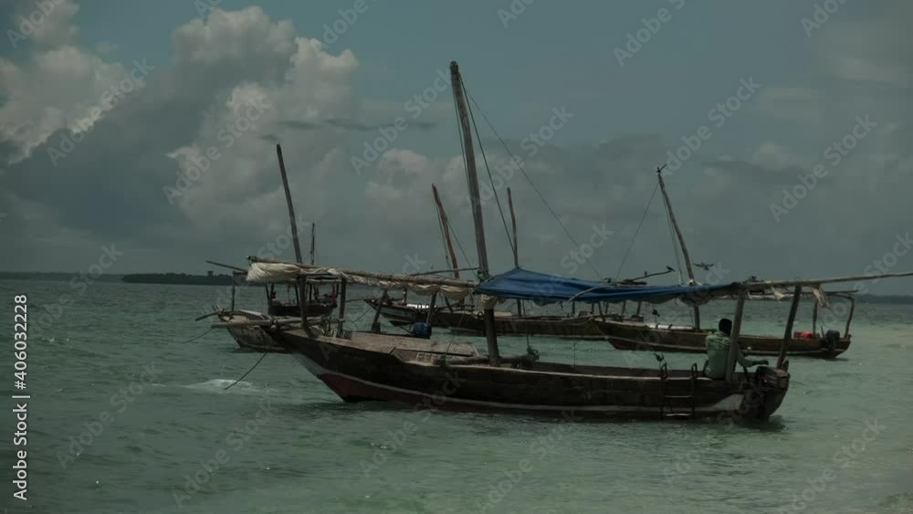 Fisherman's boat near the shore of the island of Zanzibar in the Indian Ocean. Fisherman's boat near the shore of the island of Zanzibar in the Indian Ocean.