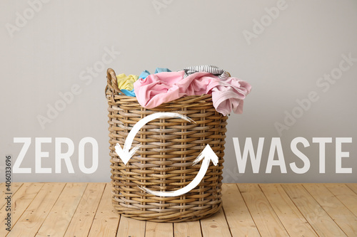 Basket with clothes near li...