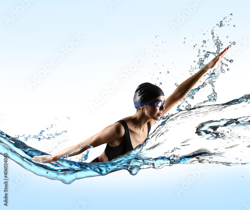 Young sporty woman swimming...