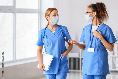 Female doctors discussing d...