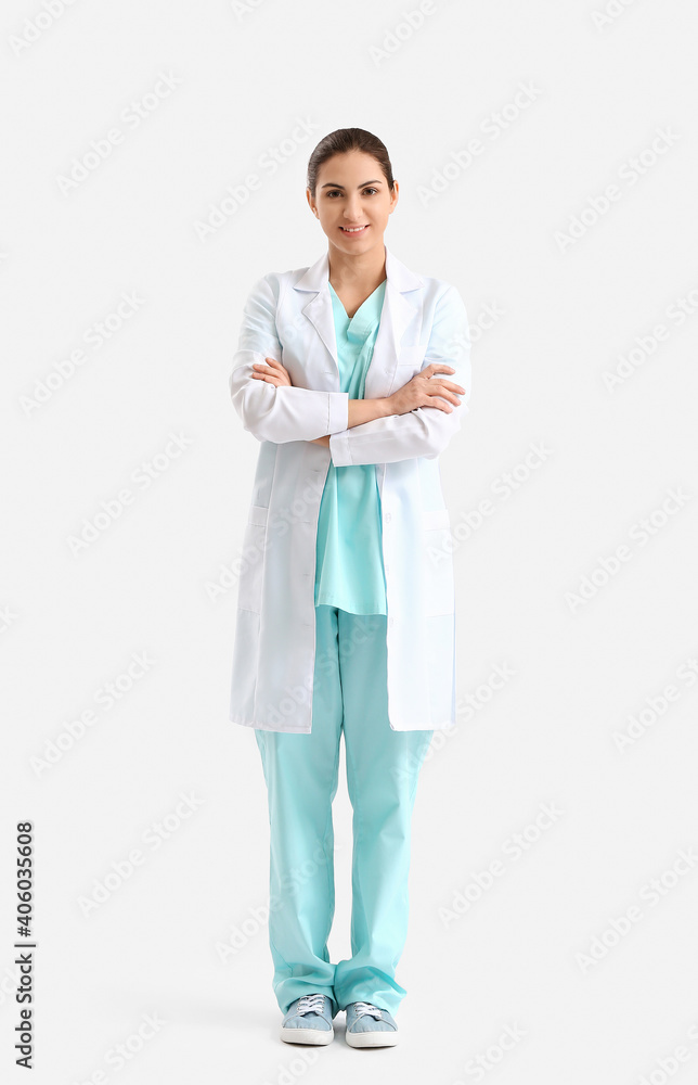 Portrait of female doctor on light background Portrait of female doctor on light background