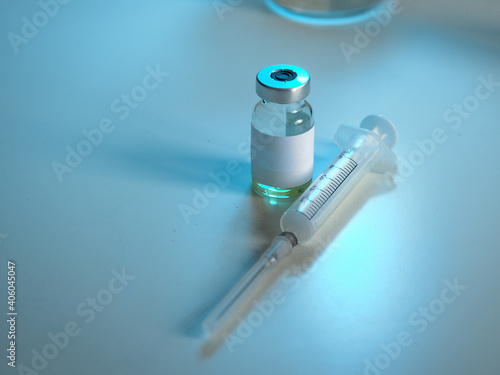 Vaccine covid-19 virus pandemic imunology, medical bottle with syringe