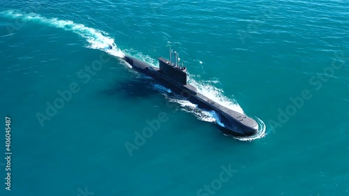 Aerial drone video of latest technology navy armed diesel powered submarine cruising half submerged