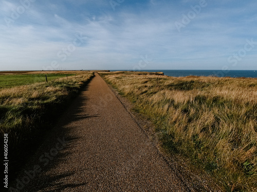 Cliff pathway at the ocean  sunny day  blue sky