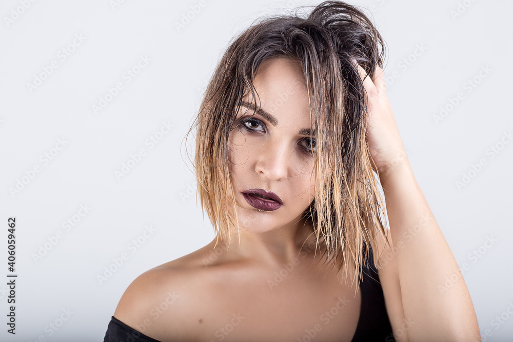 beautiful girl with wet hair on a white background beautiful girl with wet hair on a white background