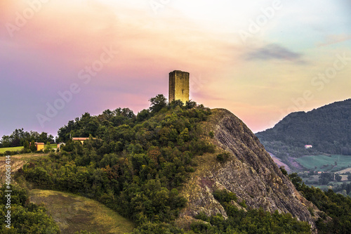 Rossena castle tower and rock cliff at blue hour, Canossa, Italy photo