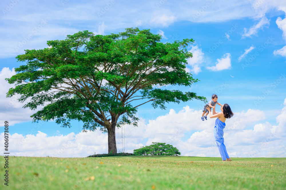 Mother And Baby outdoors. Nature.Portrait of happy loving mother and her baby outdoors Mother And Baby outdoors. Nature.Portrait of happy loving mother and her baby outdoors