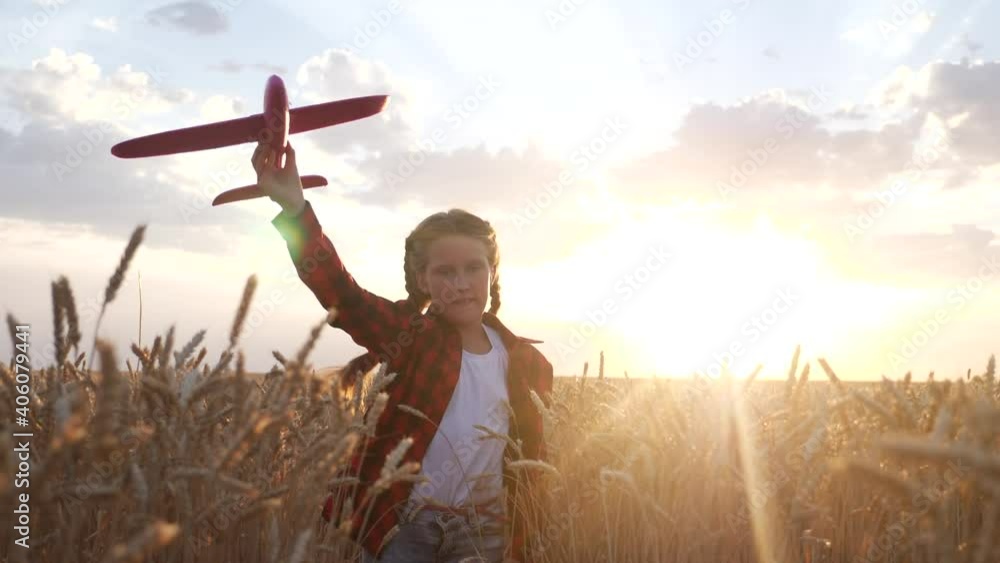 girl kid run with a toy airplane at sunset. kid dream childhood concept. girl child runs with an airplane toy silhouette in the park. carefree fun child dream outdoors silhouette. people in the park girl kid run with a toy airplane at sunset. kid dream childhood concept. girl child runs with an airplane toy silhouette in the park. carefree fun child dream outdoors silhouette. people in the park