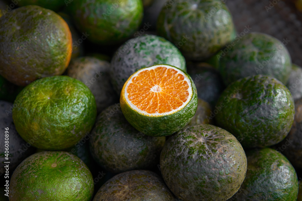 Cam sành - Vietnamese Green Oranges in a food market. Travel, food, fruit. Cam sành - Vietnamese Green Oranges in a food market. Travel, food, fruit.