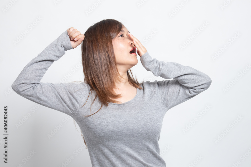 Sleepy young Asian woman yawn. Sleepy young Asian woman yawn.