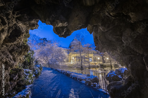 Cityscape of Madrid on a Snowy night at the Retiro Park