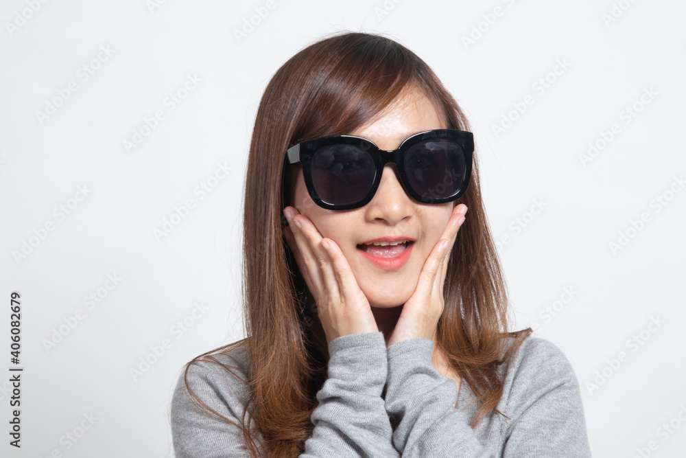 Portrait of a beautiful young asian girl in sunglasses. Portrait of a beautiful young asian girl in sunglasses.
