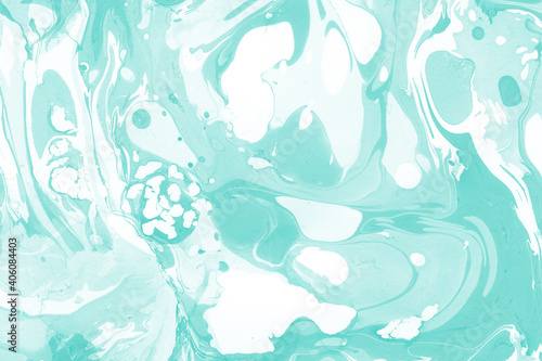 Aqua marble ink texture on watercolor paper background. Marble stone image. Bath bomb effect. Psychedelic biomorphic art.