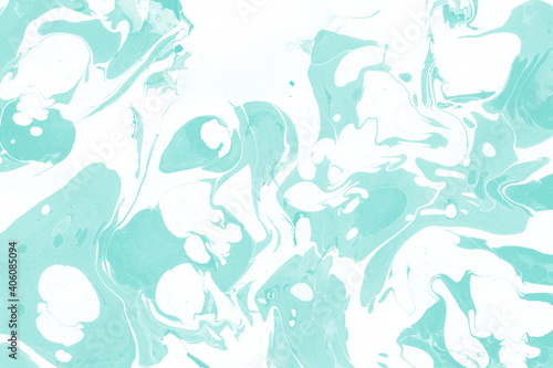 Aqua marble ink texture on watercolor paper background. Marble stone image. Bath bomb effect. Psychedelic biomorphic art.