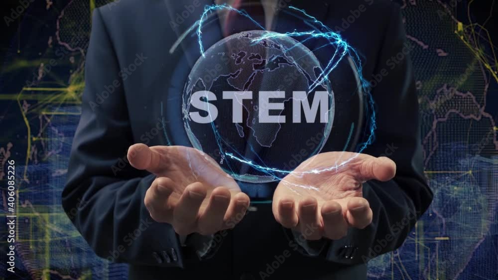 Male hands activate a conceptual holographic text STEM. Businessman in a suit with a hologram of planet Earth on a background of a futuristic wireframe city Male hands activate a conceptual holographic text STEM. Businessman in a suit with a hologram of planet Earth on a background of a futuristic wireframe city