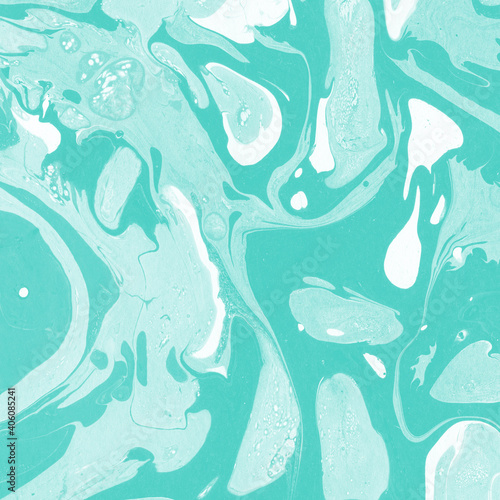 Aqua marble ink texture on watercolor paper background. Marble stone image. Bath bomb effect. Psychedelic biomorphic art.