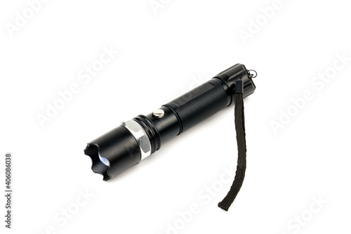 Black flashlight isolated on white background