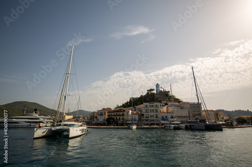 boats in the harbor view of the port country Poros, greece