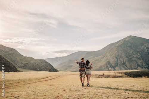 Couple walking in the mountains