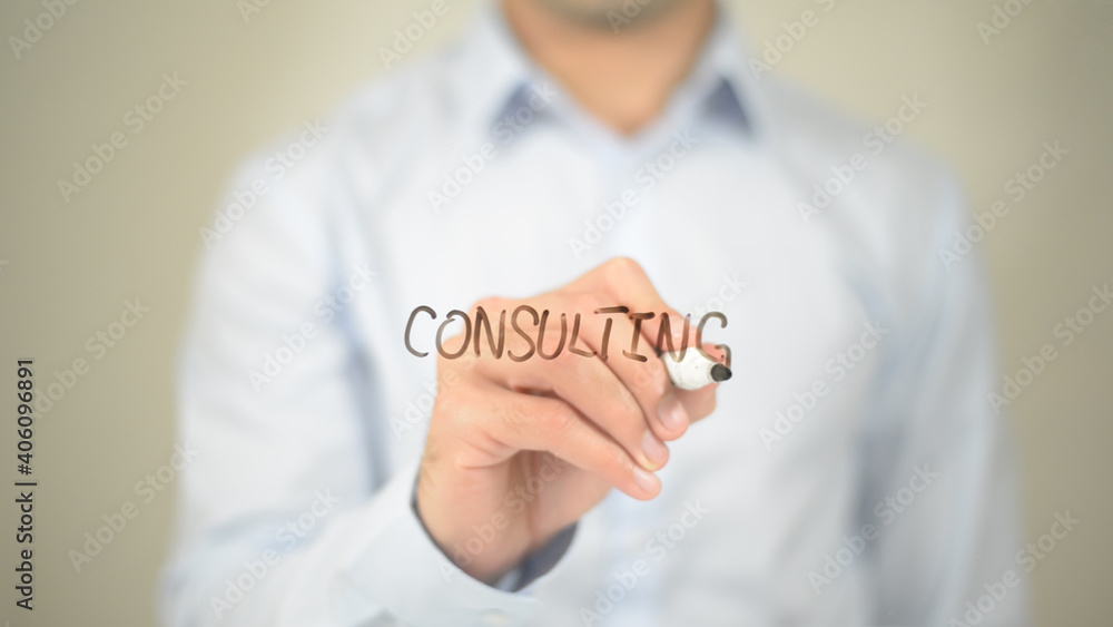 Consulting, Man writing on transparent screen Consulting, Man writing on transparent screen