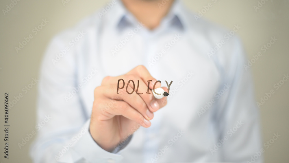 Policy , Man writing on transparent screen Policy , Man writing on transparent screen